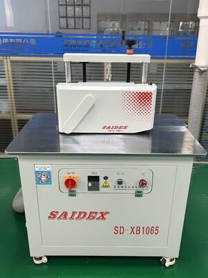 एक्रिलिक XB1065 ट्रिमिंग मशीन (स्वचालित फ़ीडिंग)